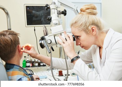 Ear, Nose, Throat Examining. ENT Doctor With A Child Patient And Endoscope