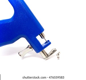 Ear Piercing Gun On White Background 