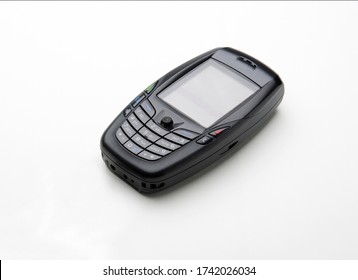 Early 2000s Cell Phone Black On White Backdrop