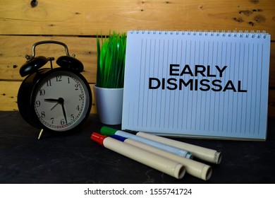 Early Dismissal Write On Book Isolated Wooden Background.