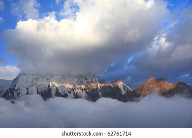 Early morning in caucasus mountains. On a background north face of mount Dykh-tau. It is second highest mountain in Europe. Its height 5206 meters