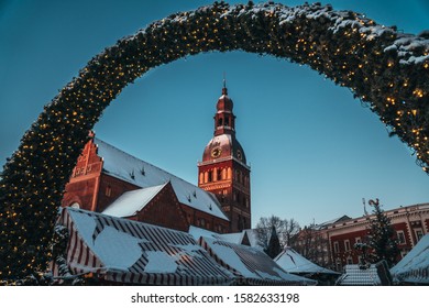 Early Morning Christmas Market First Snow. Riga Old Town.