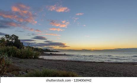 Early Morning Film Crew On The Beach Filming Jetski And Sunrise With Drone