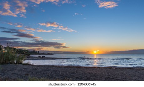 Early Morning Film Crew On The Beach Filming Jetski And Sunrise With Drone