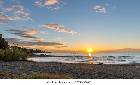 Early Morning Film Crew On The Beach Filming Jetski And Sunrise With Drone