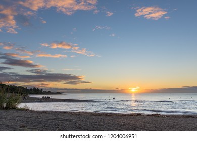 Early Morning Film Crew On The Beach Filming Jetski And Sunrise With Drone