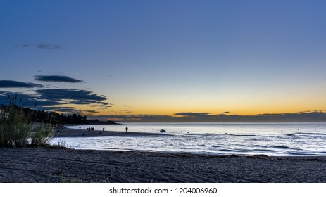 Early Morning Film Crew On The Beach Filming Jetski And Sunrise With Drone