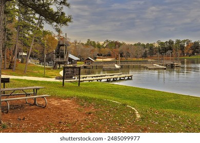 Early Morning At Lake Livingston State Park, Livingston, Texas 12-14-2023: The tranquil lake reflects the dawn sky's vibrant colors, creating a peaceful and scenic landscape.  - Powered by Shutterstock