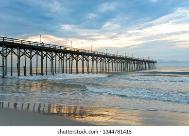 Early morning light over the fishing pier at Carolina Beach, NC, USA