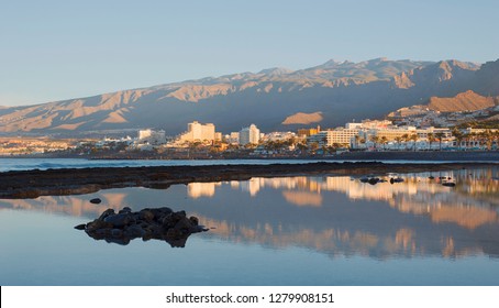 Early Morning Light Over The South-west Coast Of The Island, Towards The Most Popular Resorts In Costa Adeje For Entertainment, Eateries And Nightlife, In Las Americas, Tenerife, Canary Islands, Spain