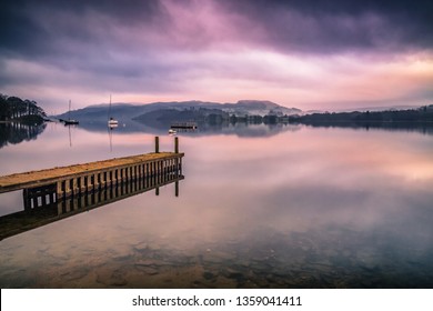 Early morning mist on Lake Windermere the largest natural lake in England. It is a ribbon lake formed in a glacial trough after the retreat of ice at the start of the current interglacial period. 