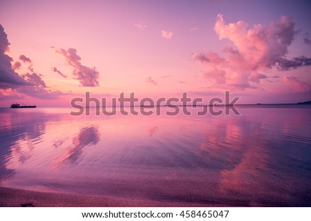 Early morning, pink sunrise over sea 
