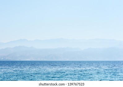 Early morning, the Red Sea and the mountains in the haze - Shutterstock ID 139767523
