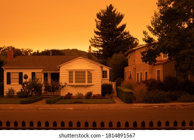 Early Morning In Suburbia Under An Orange Fire Sky