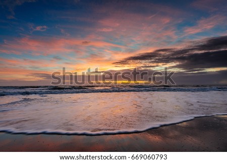 An Early Morning sunrise over Cocoa Beach, Florida, USA.