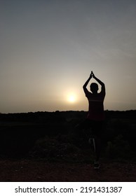 Early Morning Yoga In Sunrise .