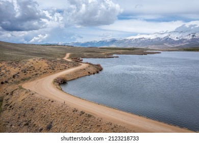 Early Spring Aerial View Of North Park In Colorado - Meadow Creek Reservoir And Medicine Bow Mountains