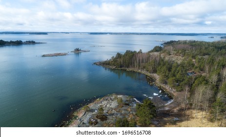 Early Spring Sea Landscape. The Archipelago. Beautiful Islands And Fir Forest. Drone Photo From Above. Nordic Nature. Finland.