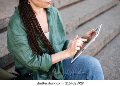 Earn Extra Money, Side Hustle, Money Making, Gig Economy, Hustling, Digital Nomad. Side Jobs To Make Some Extra Money. Young Woman, Student With Tattoo And Dreadlocks Working Outside