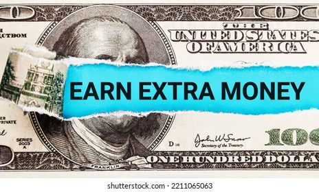Earn extra money text written on with American Dollar-bills. Text Earn extra money on dollar usa background. Concept of financial planning Make more extra money from parttime side hustle or second job - Shutterstock ID 2211065063
