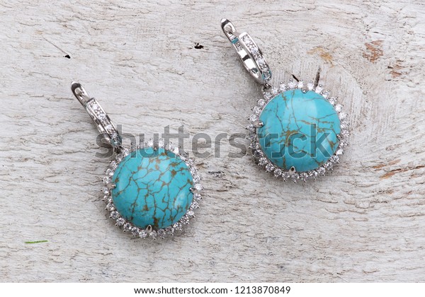 Earrings jewelry\
with natural turquoise\
gemstone