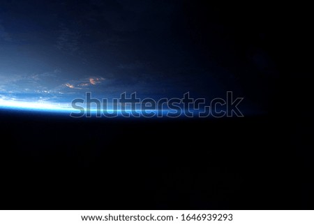 Earth atmosphere from space Elements of this image were furnished by NASA.