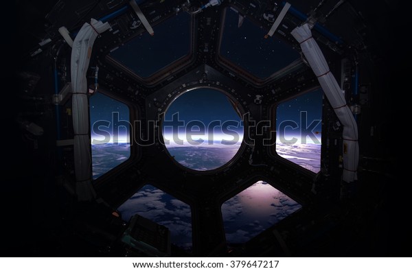 Earth - Beauty\
of solar system planet in spaceship window porthole. Elements of\
this image furnished by\
NASA