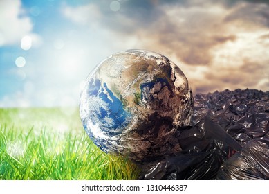 Earth is chancing due to pollution and undifferentiated trash. Save the World. World provided by NASA - Shutterstock ID 1310446387