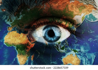 Earth continents painted on face skin, concept save the planet. Image of earth painted on face skin. Creative composition of eye and planet earth. Elements of this image furnished by NASA . - Powered by Shutterstock