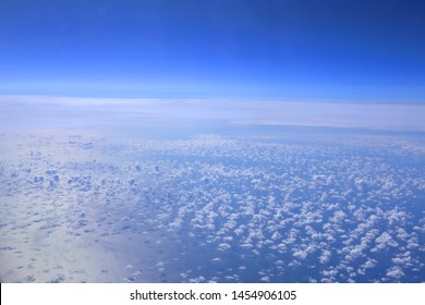 Earth Curvature Seen From Aircraft Window At High Altitude