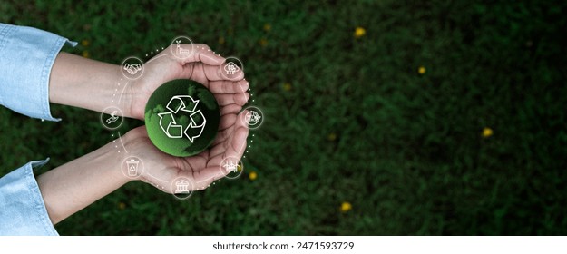 Earth Day,renewable,Energy,sustainable,Environment,Reuse,Reduce,Recycle Ecosystem,Zero waste,net zero,CSR,ESG concept.Green earth ball in hand and Recycle Sustainable sign in green bokeh background. - Powered by Shutterstock