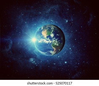  Earth and galaxy. Elements of this image furnished by NASA.