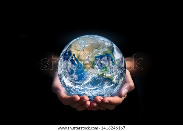 earth in hands. green planet on\
hand. save of earth. environment concept for background web or\
world guardian organization.Elements of this image furnished by\
NASA