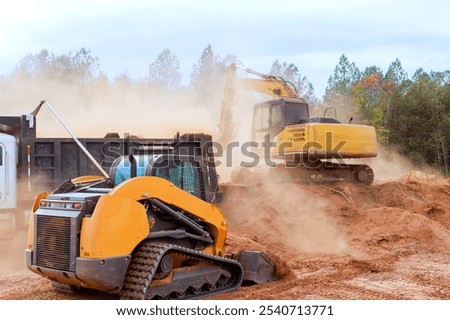 Earth loading is process of moving earth into dump truck using an excavator