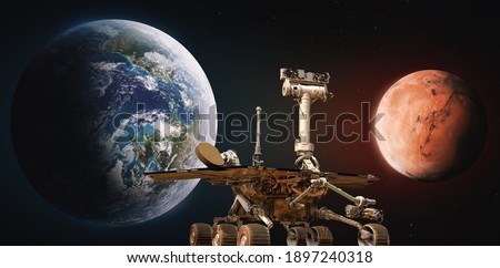 Earth and Mars planet. Rover Perseverance. Space mission to red planet. Exploration. Elements of this image furnished by NASA.
