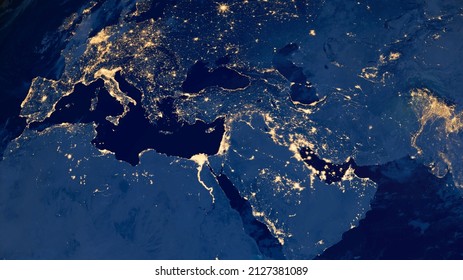 Earth photo at night, City Lights of Europe, Middle East, Turkey, Italy, Black Sea, Mediterrenian Sea from space, World map on dark globe on satellite HD photo.Elements of this image furnished by NASA - Shutterstock ID 2127381089