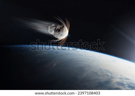 Earth planet and asteroid in outer space. Meteorite in outer space near Earth planet. Elements of this image furnished by NASA.
