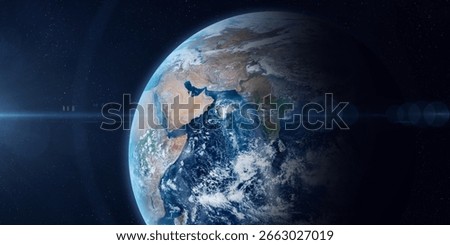 Earth planet. Eastern hemisphere. Earth Surface with ocean, continents and clouds. Middle East, Asia India, Pakistan, Saudi Arabia viewed from space. Elements of this image furnished by NASA.