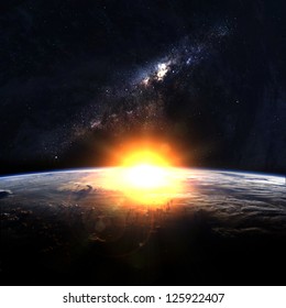 Earth With Rising Sun In Space