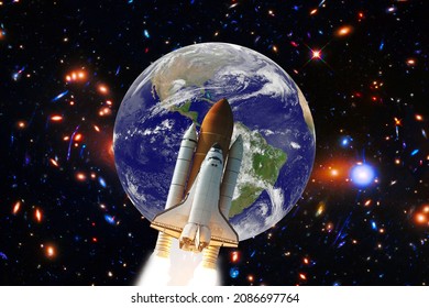 Earth And Rocket In Space. The Elements Of This Image Furnished By NASA.

