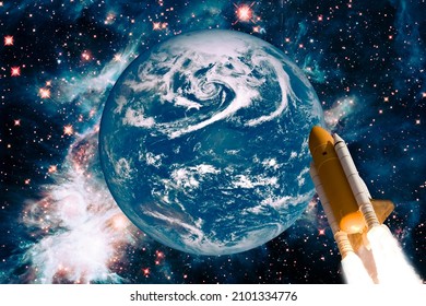 Earth And Rocket In Space. The Elements Of This Image Furnished By NASA.

