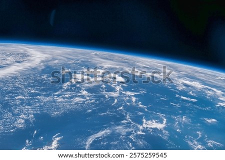 Earth from space with shining background. Outer space earth atmosphere celestial show. Earth in space. Earth atmosphere. Blue planet in space. Elements of this image furnished by NASA