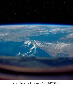 Earth and spaceship. The elements of this image furnished by NASA.