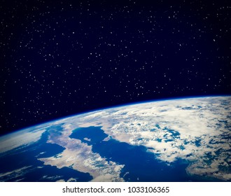 Earth and stars. The elements of this image furnished by NASA. - Shutterstock ID 1033106365