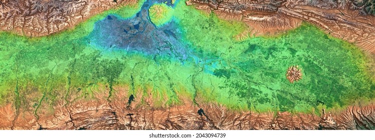 Earth Surface In Satellite Photo. Aerial Top View Of Green Fields At River Delta As Panoramic Abstract Background. Nature, Terrain, Map And Topography Theme. Elements Of This Image Furnished By NASA.