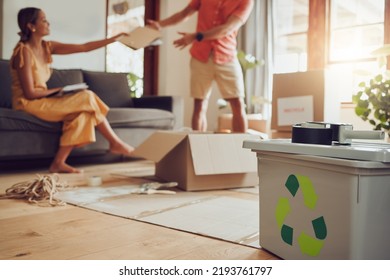 Earth, sustainability and recycling, eco friendly couple in home waste management. Man and woman sort paper and plastic to recycle. Conservation, nature, and environment, saving the planet for - Powered by Shutterstock