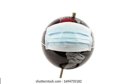 Earth wearing medical mask to fight against Coronavirus. Mask over globe isolated on white background to provide concept of prevent spread of omicron variants covid-19. Everyone wear mask in public.