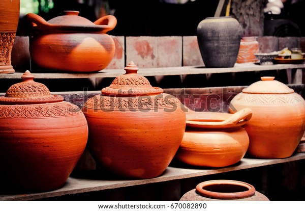 Earthenware\
handmade old clay jar in thailand\
traditional
