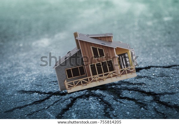 Earthquake crisis\
house risk insurance\
concept