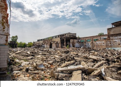Earthquake or war aftermath or hurricane or other natural disaster, broken ruined abandoned buildings, pills of concrete garbage